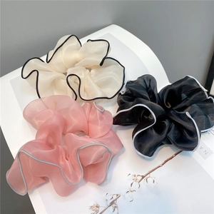 Three-piece set of elegant organza scrunchies in cream, pink, and black with edge piping