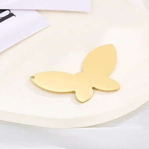 Polished gold stainless steel butterfly pendant with a smooth mirror finish