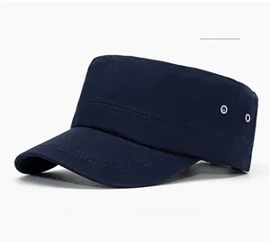 Detailed macro view of the navy blue cotton fabric and metal side vents on a cadet cap