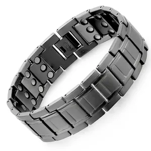 Detail of black plated stainless steel men's bracelet with health magnetic stones