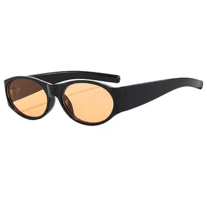 Retro oval sunglasses with thick black frame and bright orange tinted lenses for unisex