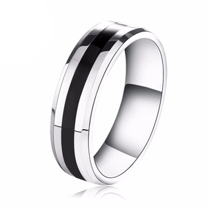 Polished titanium steel ring with black enamel inlay shown on a clean white background