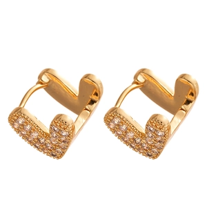Golden V-shaped huggie earrings with pavé zircons on a clean white background