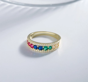 Macro shot of S925 silver ring featuring rainbow gemstones and double row micro diamonds