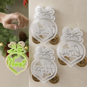 Christmas bow heart silicone molds featuring Noel, Love, Hope and Joy lettering for DIY crafts