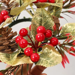 Artificial Christmas candle ring with red berries, pine cones and green foliage decor