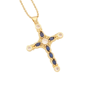 Golden cross necklace with dark blue marquise-cut stones and white zircon on bead chain