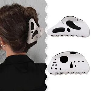 Ghostface Halloween hair claw clip in black and white finish for spooky hair styling