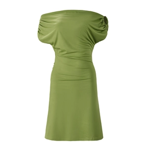 Detail of ruched texture and off-shoulder design on a slim-fit green party dress