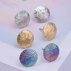 Detailed view of 304 stainless steel stud earrings with unique irregular rippled texture
