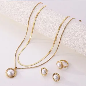 Elegant gold-plated stainless steel jewelry set with double necklace, pearl ring and earrings