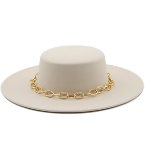 Flat top beige wool boater hat with a bold gold chain band and wide brim for women