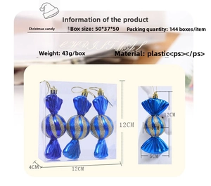 Detail of blue candy Christmas tree ornaments with gold glitter stripes and hanging cords