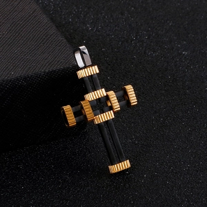 Macro detail of industrial punk cross pendant featuring gold gears and black matte finish