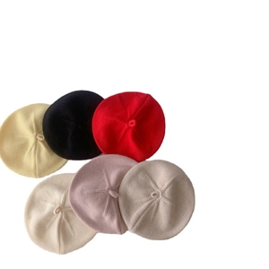 Cute knitted baby beret hats in six assorted colors including yellow and purple