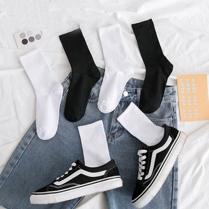 Breathable cotton crew socks in black and white set with elastic ribbed cuffs