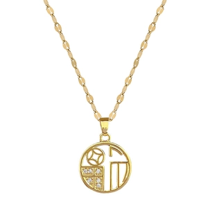 Gold titanium steel necklace featuring a hollow round lucky pendant with zircon accents