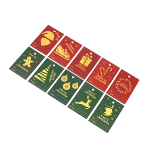 Christmas gift tags set in red and green with gold festive reindeer and tree patterns