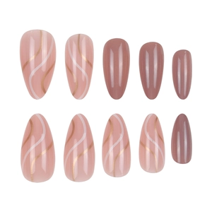 Almond-shaped press on nails featuring minimalist wave lines and rose pink finish