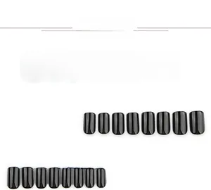 Glossy black press-on nails set in short square shape with various sizes on white backdrop