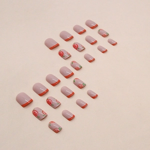 Short cute orange press-on nails with French tips and fruit patterns for summer style
