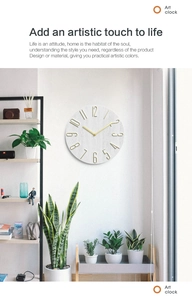 Close-up of modern 12-inch wall clock with grey wood grain and golden numeric details