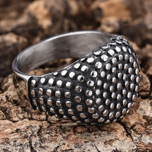Vintage punk style men's stainless steel ring with textured dot pattern on tree bark