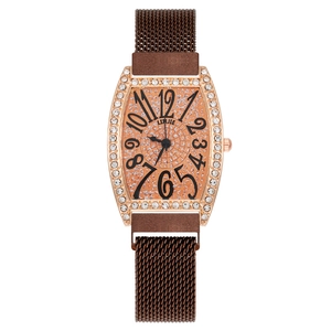 Women's rose gold tonneau watch with rhinestone bezel and orange glitter dial on mesh strap
