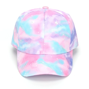 Detail of colorful tie-dye baseball cap with pink and blue gradient and star patterns