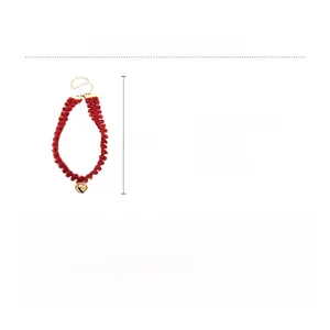 Ras de cou rouge tricoté avec clochette dorée et chaîne réglable, 42cm, 5,8g