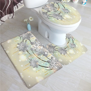 Detailed view of the 3-piece bathroom mat set with snowflake patterns and gradient colors