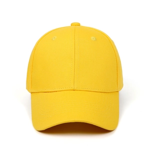 Close-up of bright yellow cotton twill baseball cap with six-panel design and curved brim