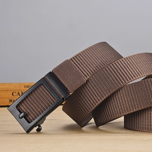 Detail of coffee brown nylon belt featuring a high-density weave and matte black buckle