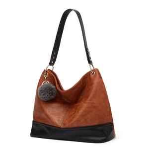 Large capacity tote bag with brown and black patchwork and stylish fur ball charm