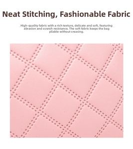 Close-up of pink litchi texture leather with neat stitching for wallet durability