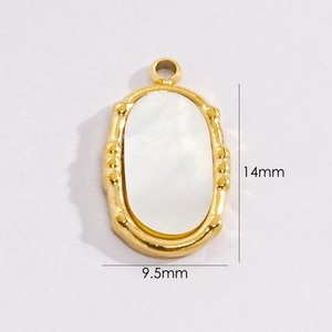Detailed view of 14mm x 9.5mm oval shell pendant with 14K gold plated titanium steel frame