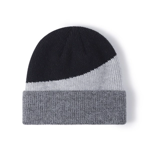Winter knit beanie featuring a stylish three-color patchwork design in black and grey