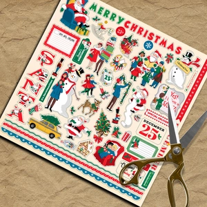Flat lay of vintage Christmas scrapbooking stickers with scissors on kraft paper