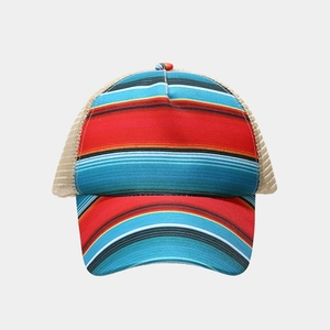 Close-up of colorful serape striped trucker hat with breathable beige mesh back panels