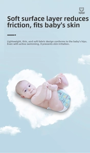 Macro view of soft thin baby swimming diaper with ocean prints on a cloud background