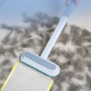 Long handle pet hair remover brush for carpets showing effective cleaning results