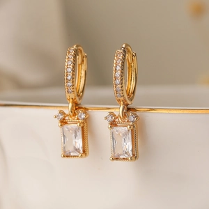 Elegant 18K gold plated heart geometric earrings with sparkling zircons on a ceramic rim