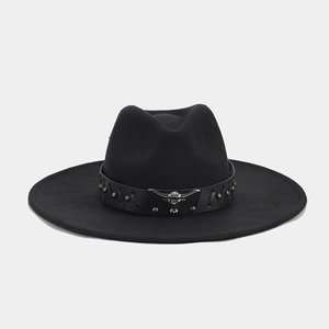 Detail of black wool fedora with silver bull head buckle and metallic rivet band