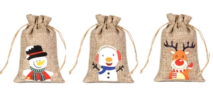 Three Christmas burlap drawstring bags with snowman and elk prints on a white background
