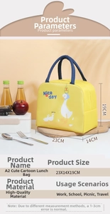Yellow cartoon lunch bag with white goose print and blue handles on a wooden tray