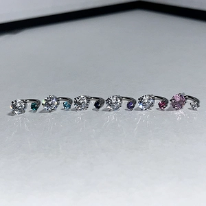 Titanium steel horseshoe earrings with vibrant CZ stones in seven colors for women