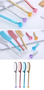 Macro shot of comb-shaped gel pens in blue, silver, and gold with diamond top detail
