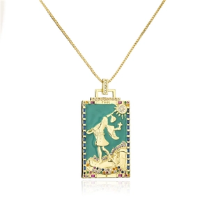 Detailed macro of 18K gold-plated tarot card pendant featuring The Fool with zircon
