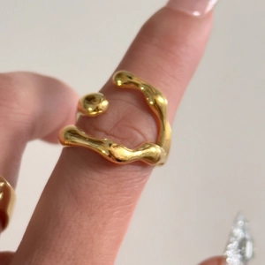 Minimalist 18k gold plated stainless steel lava ring with irregular melted texture design