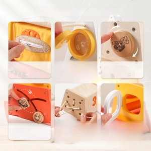Detail of Montessori wooden toy with zipper, slide track, and shape sorting educational modules